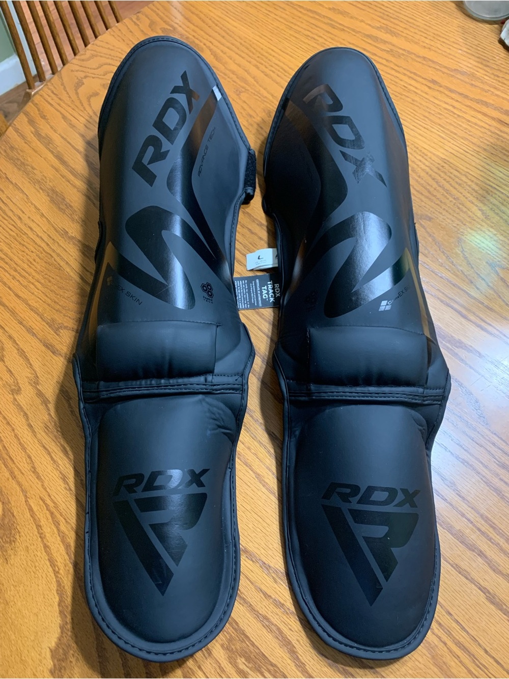 RDX leg padding for MMA/martial arts training in size L.